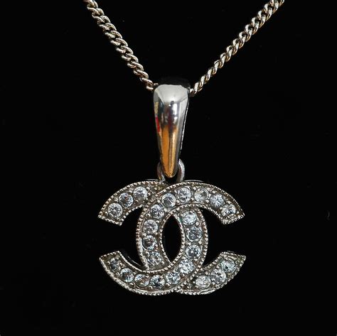 chanel necklace logo price|Chanel long necklace with logo.